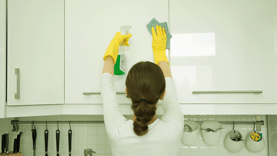 Cleaning kitchen cabinets