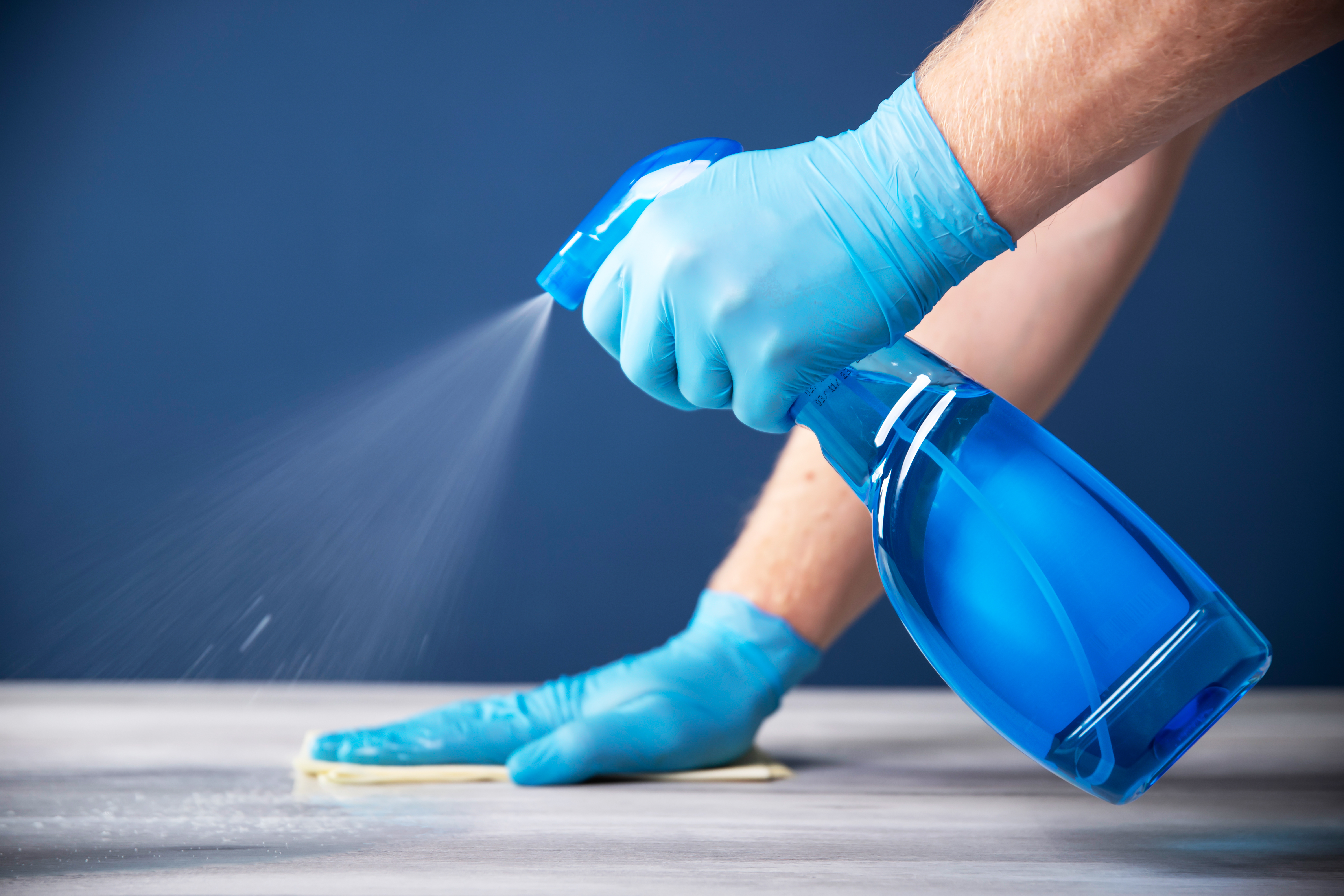 closeup of man hand cleaning floor