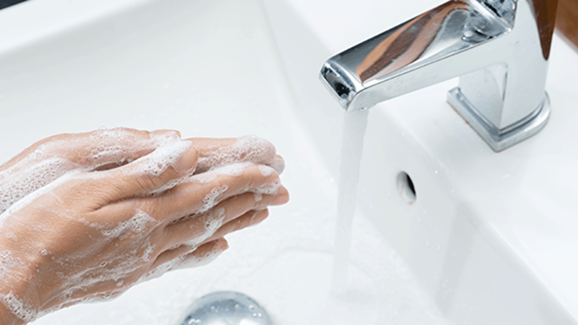 Washing Hands in the Sink