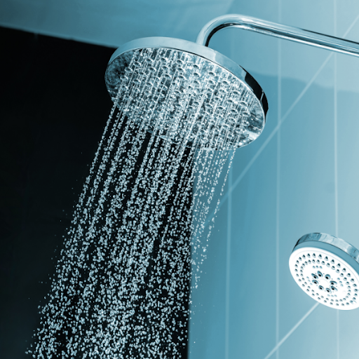 a picture of a showerhead from which water is running